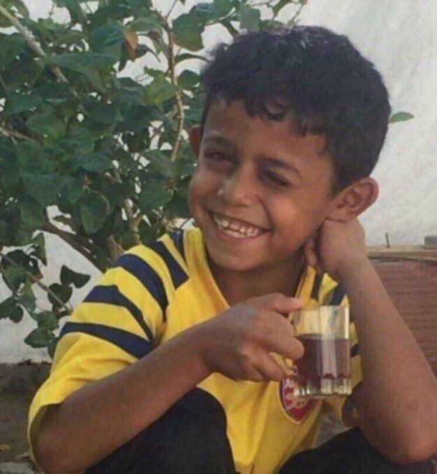 Kid sipping tea with resignation